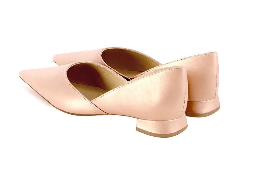 Powder pink women's open arch dress pumps. Pointed toe. Flat flare heels. Rear view - Florence KOOIJMAN